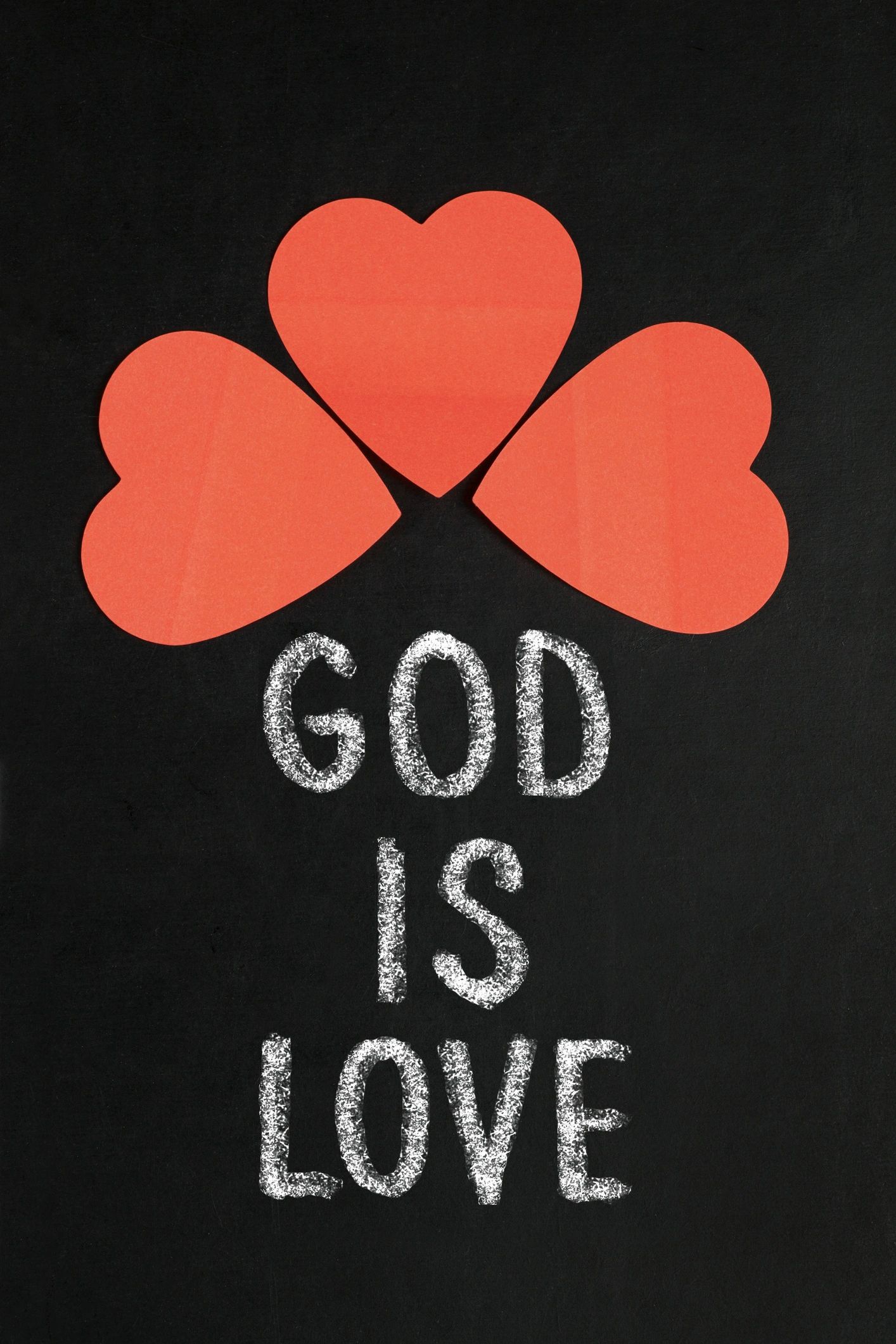 Paper heart and text God is love on